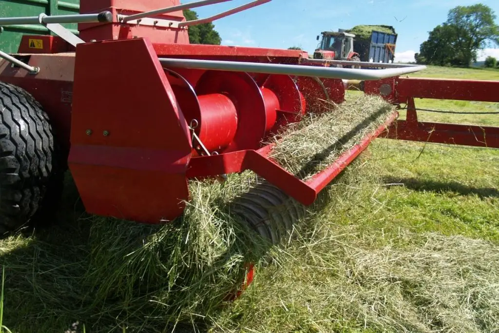 Farm equipment creating silage