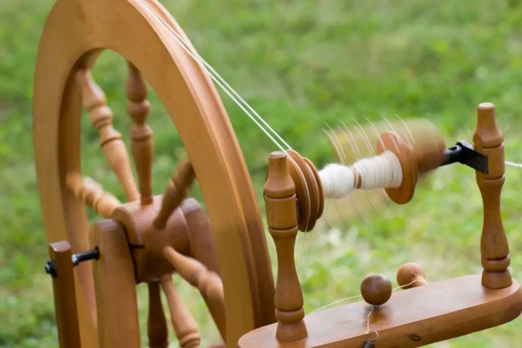 A spinning wheel with thread